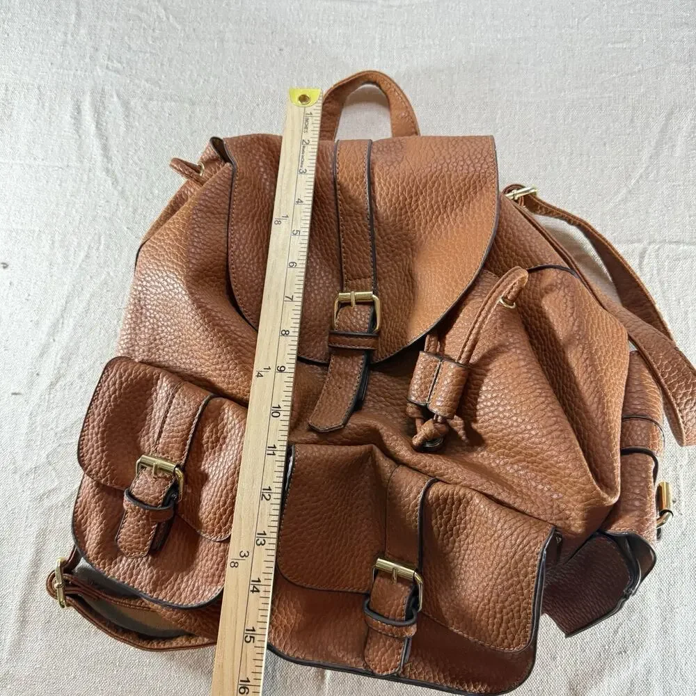 JustFab Brown Faux Leather Mini Backpack Purse Drawstring Flap Buckle Pockets